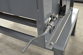 brush tension adjustment lever